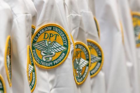 White coats with Clarkson University DPT Emblem