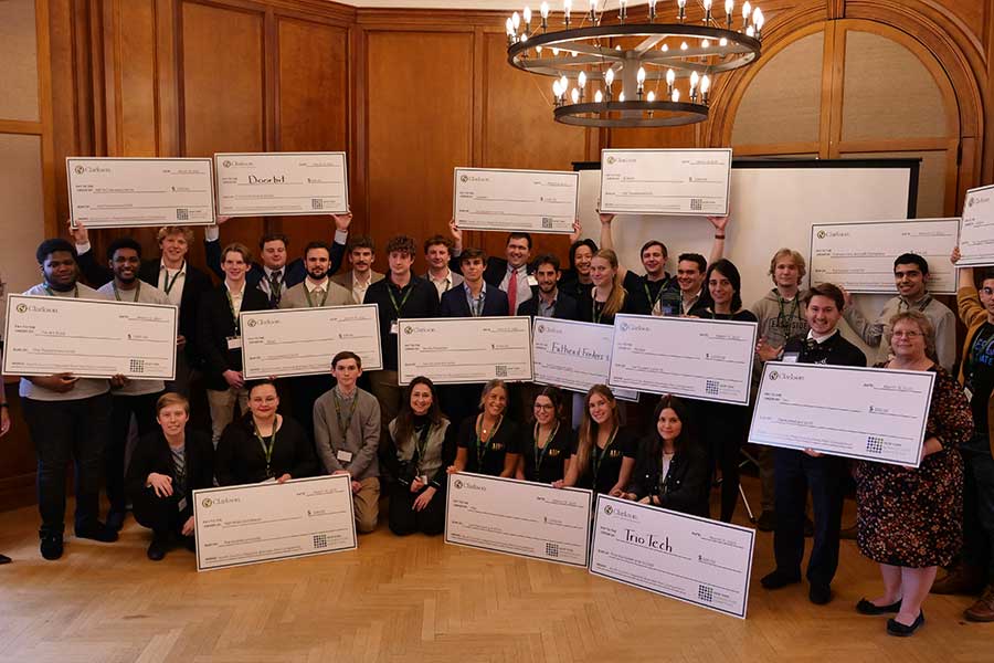 Students with Their Checks from the Business Competition