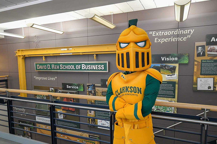 Reh School of Business sign with a golden knight