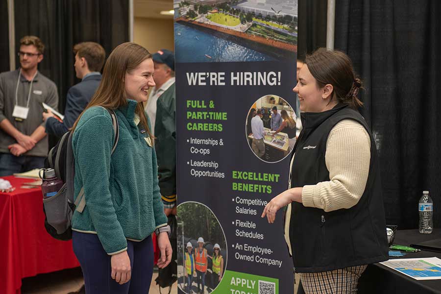 A student meeting with an employer at the career fair