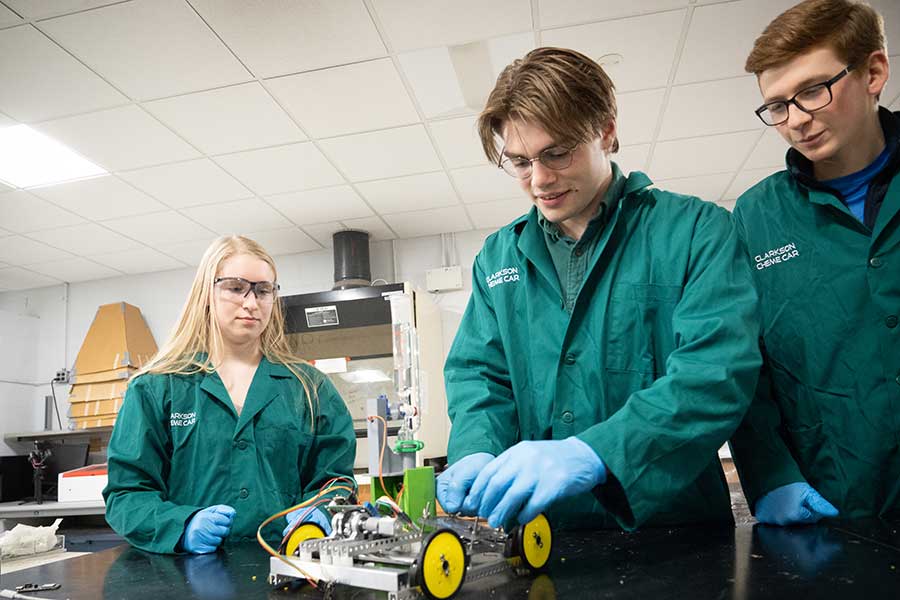 Students working on the Chemical Engineering Car