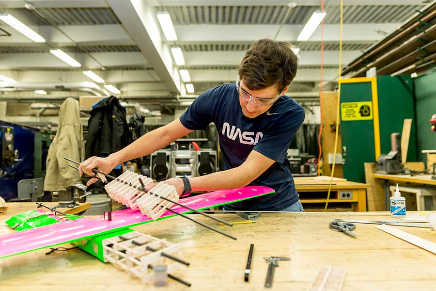 Students working on the Design, Build and Fly airplane