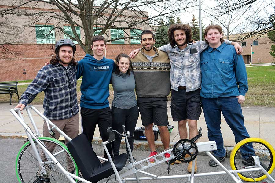 Students in front of the human powered vehicle