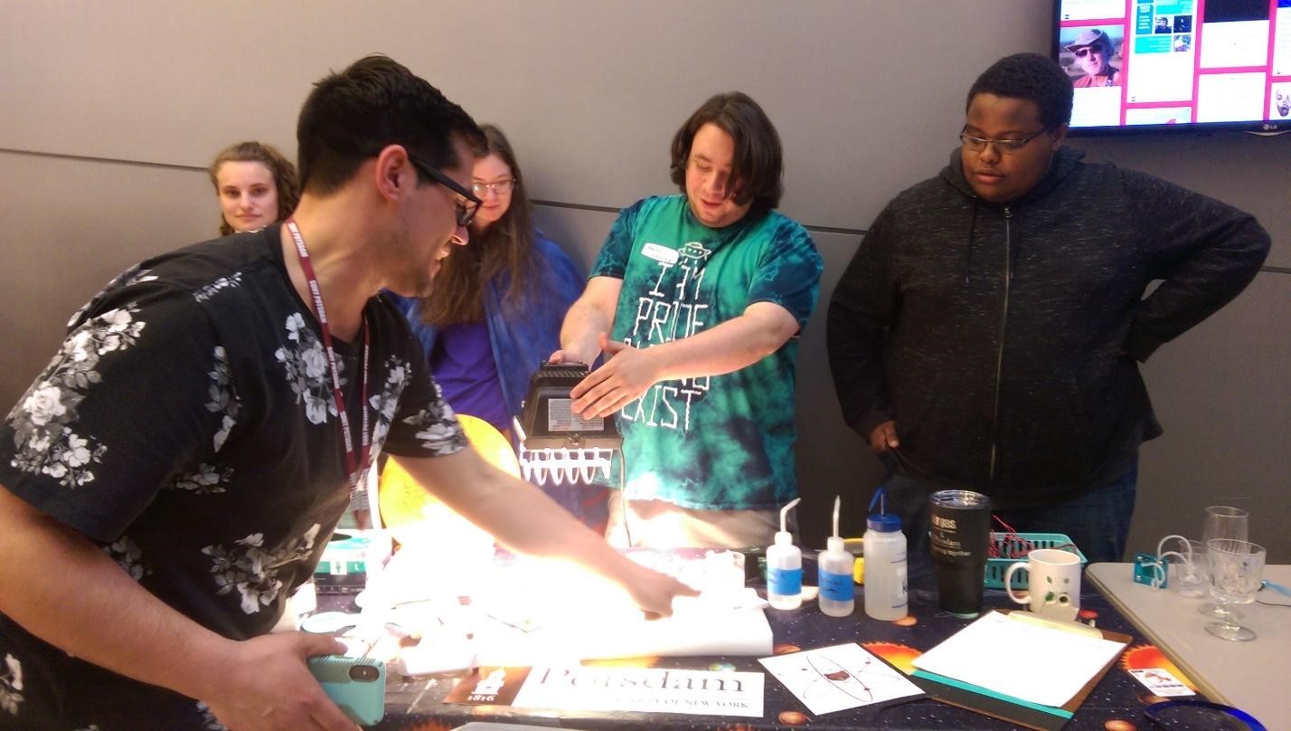 Students work with each other on a project at Sustainability Day