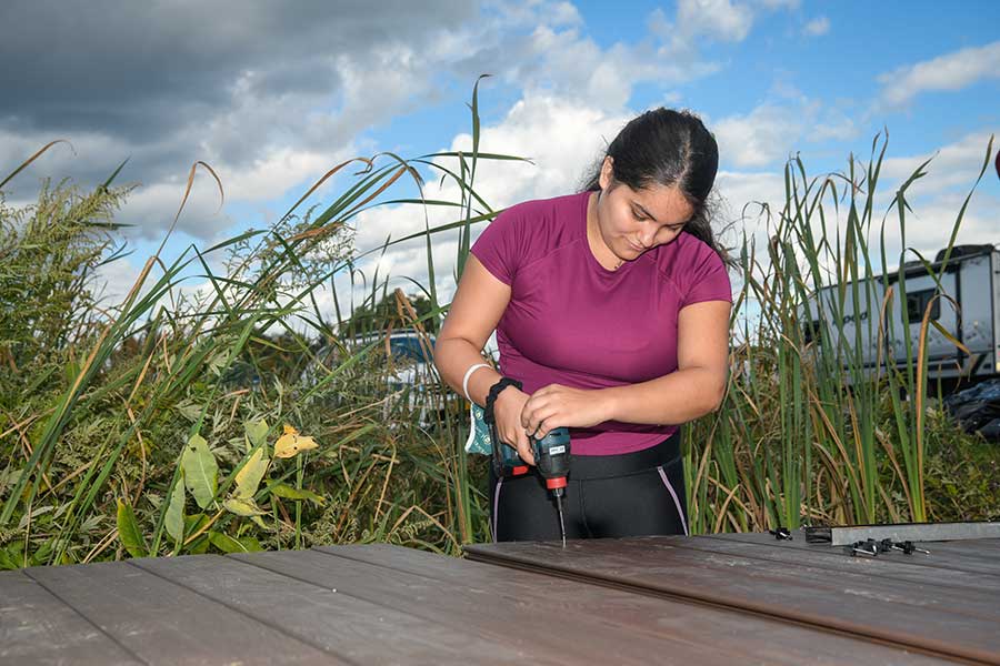 Student working on the timber bridge