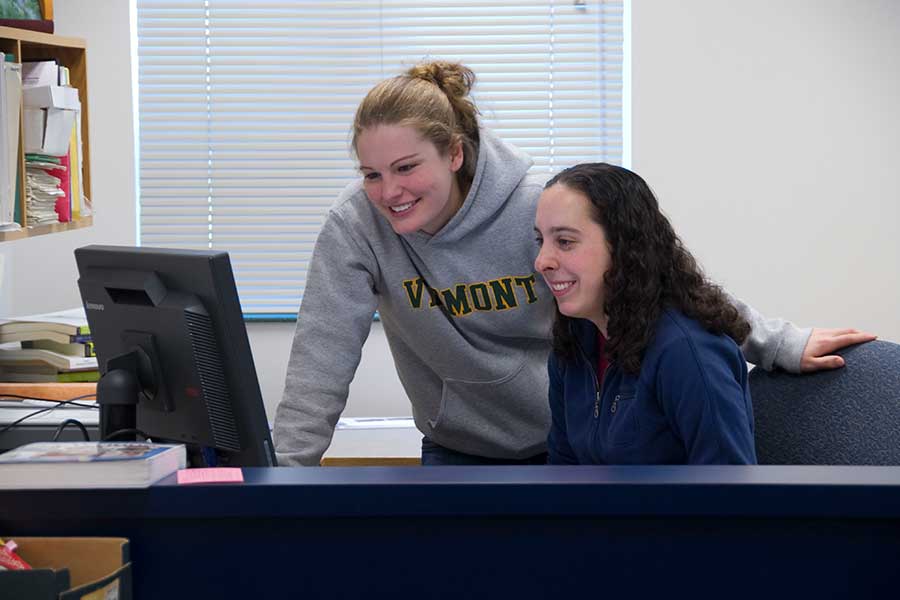 Students working together in the writing center