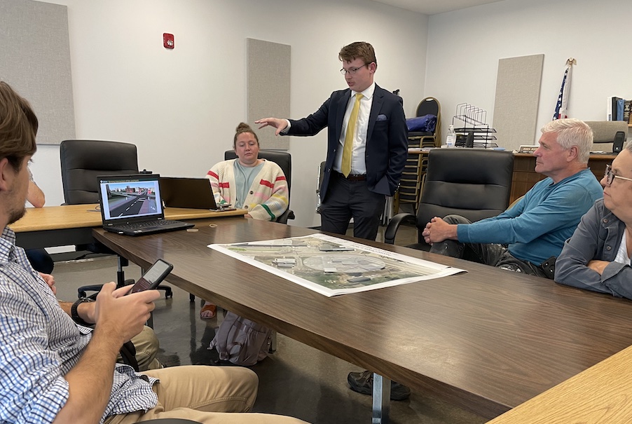 Students present summer research project. 