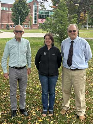 Portrait of Robert Dowman, Katie Kavanagh and Lennart Johns outside Snell Hall on the Clarkson University Collins Hill Campus