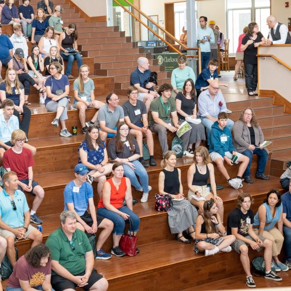 A photo of students and parents at a visit day