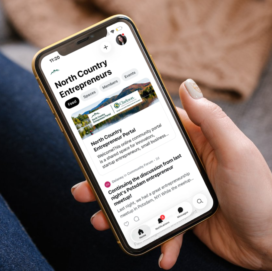 Cell phone showing the North Country Entrepreneurs online portal.