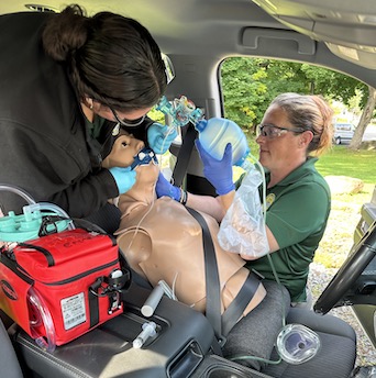 Clarkson University students in the EMS program work on a "patient."